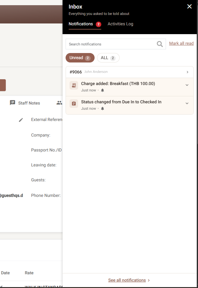 The Inbox panel showing two unread notifications grouped under a reservation
